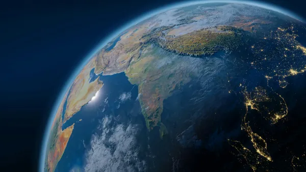 Satellite view of Indo-Pacific region showing Asia, Indian Ocean, and Pacific maritime trade routes at night